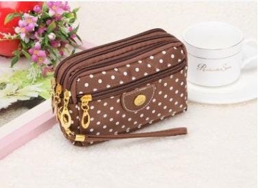 Canvas handbags handbags Korean version of the three-zipper multi-layer wallet hand bag packet phone change