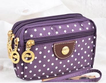 Canvas handbags handbags Korean version of the three-zipper multi-layer wallet hand bag packet phone change